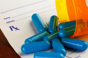 Blue Capsules on a Prescription Form