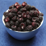 black raspberries in a bowl