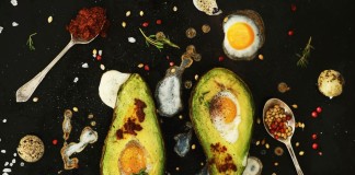 vibrant avacado and eggs with spoons of spices