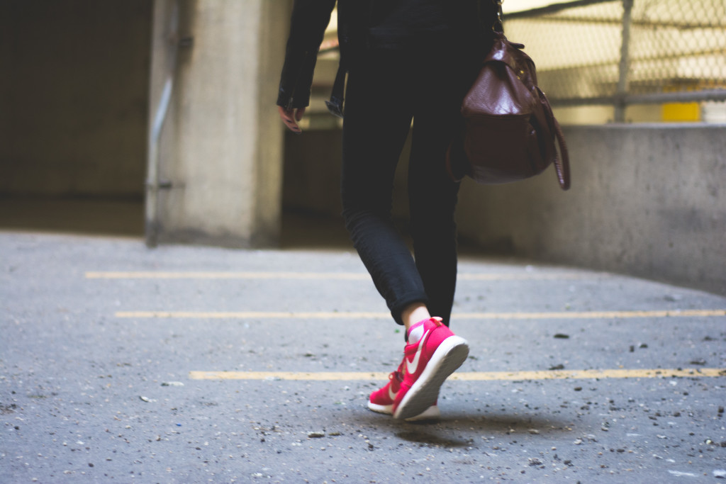 woman walking in red shoes