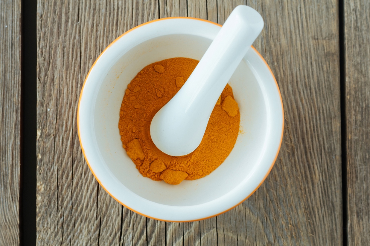 Mortar and pestle with turmeric