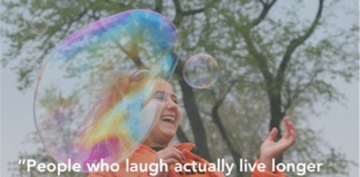 quote about healthy laughter over a picture of a girl laughing and blowing bubbles