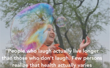 quote about healthy laughter over a picture of a girl laughing and blowing bubbles