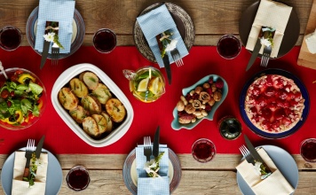 Festive table set with holiday foods