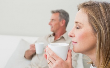 man and woman drinking tea