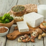 64449148 – selection vegan protein sources on wood background, copy space