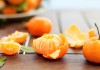 Fresh tangerines on a wooden table