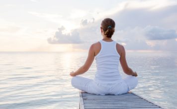 Woman meditating; yoga