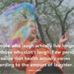 quote about healthy laughter over a picture of a girl laughing and blowing bubbles