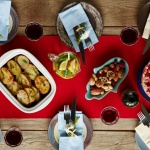 Festive table set with holiday foods