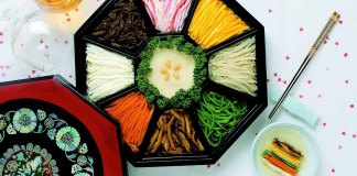 relish tray with assorted Julienned vegetables and chopsticks
