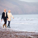 senior-couple-beach_medium